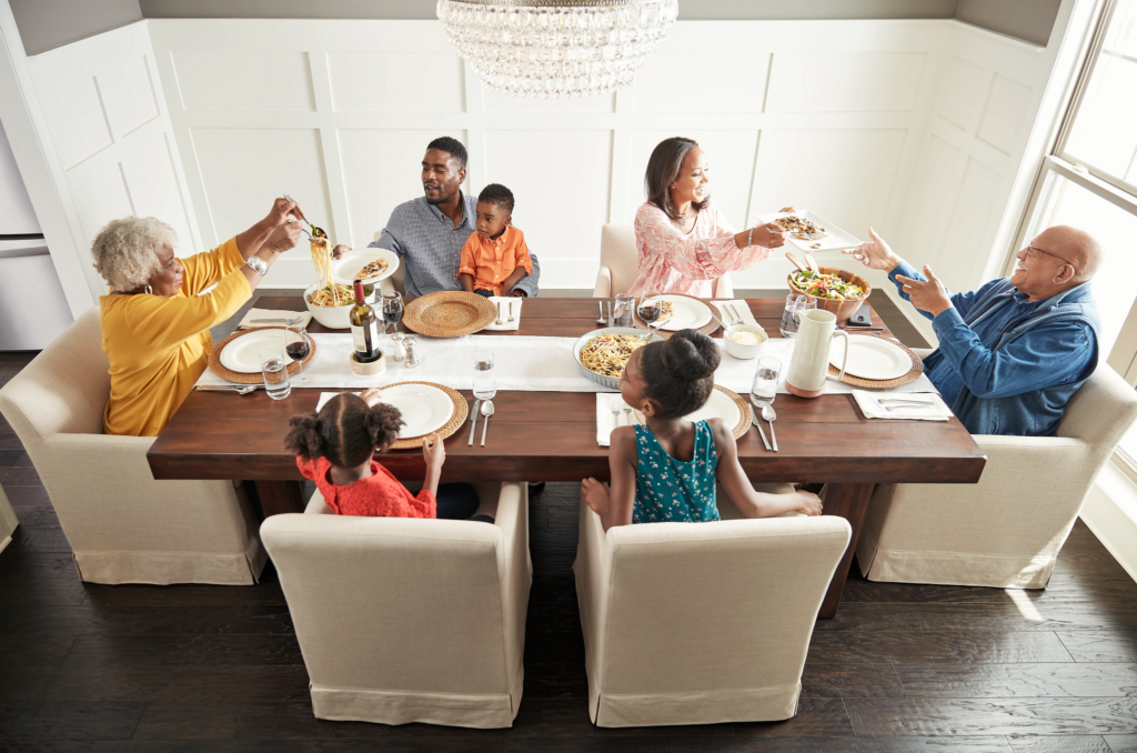 Family having breakfast at the dining table | Great Floors