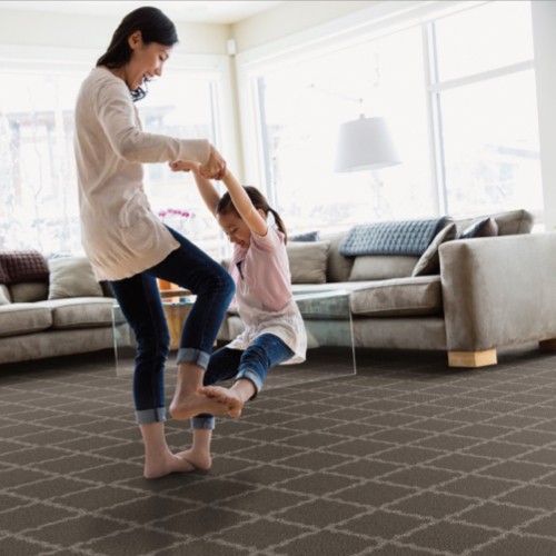 Mother dancing with her daughter on her feet | Great Floors